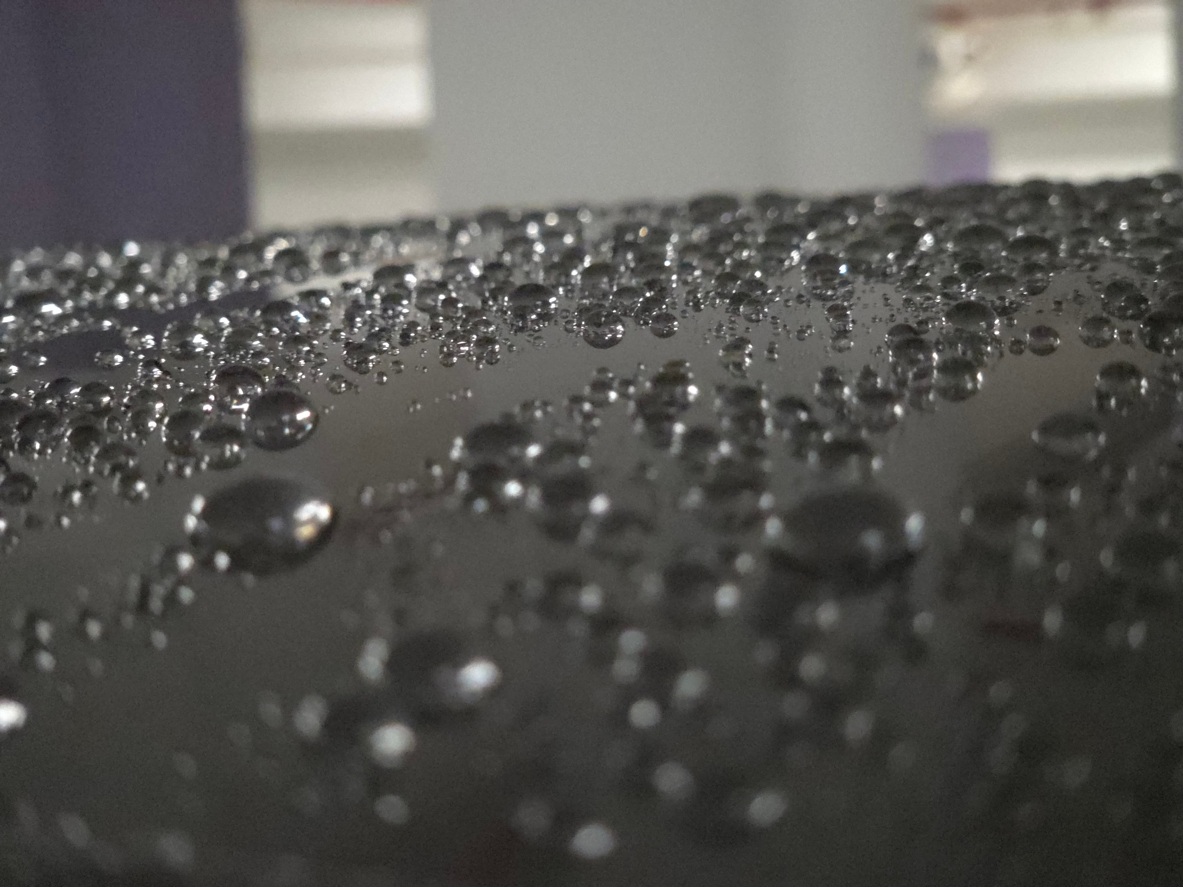 Macro water beading on treated paint